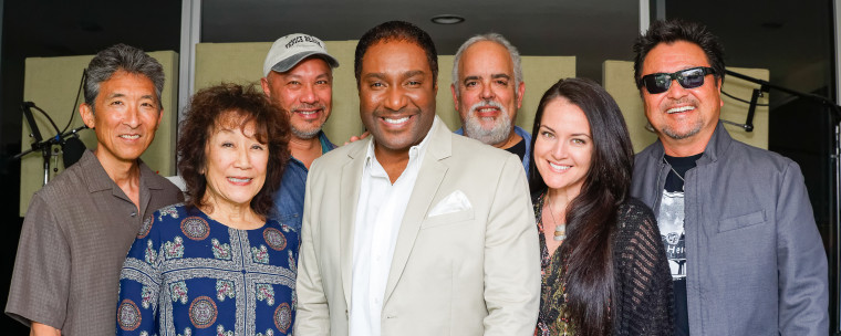 Guest vocalists Terry Steele and Yvette Nii, who performed on Hiroshima's "Legacy" album, pose with five members of the group.