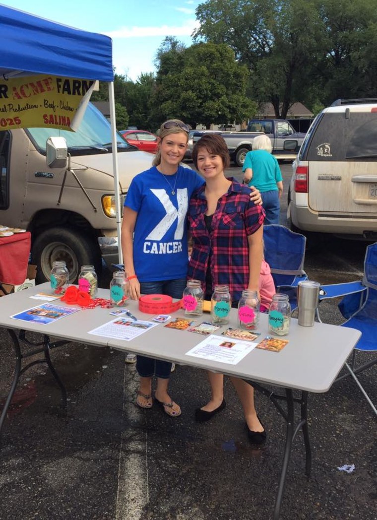 Lori’s daughters Genell and Joni at a fundraising event to raise money for the reward fund.