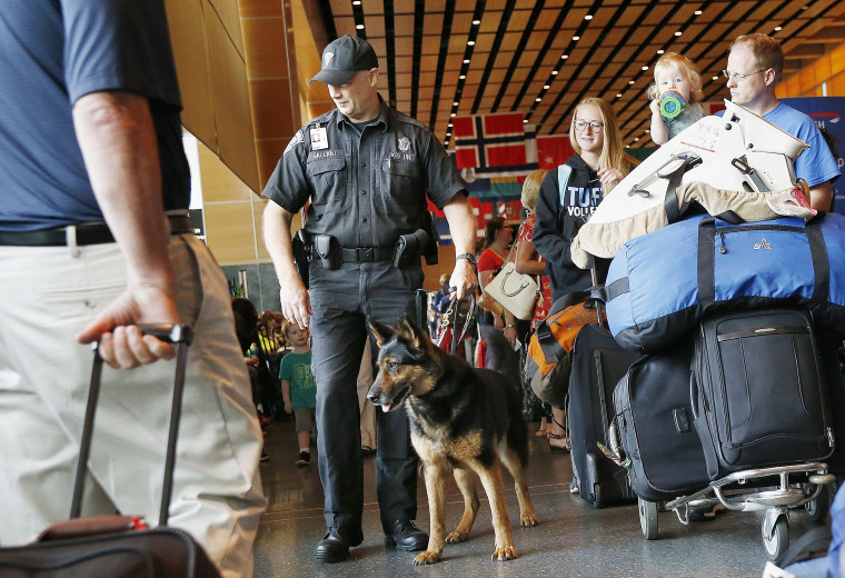 Image: Bomb-sniffing patrol at Logan International Airport on July 1