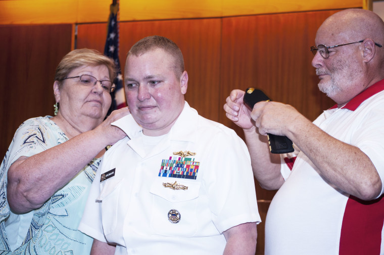 Navy Lt. Cdr. Blake Dremann with his parents Rev. Dr. Dave Dremann and Mrs. Diane Dremann