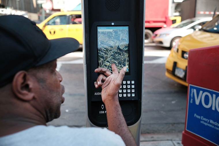 Image: Homeless New Yorkers Use WiFi Kiosks To Stay Connected