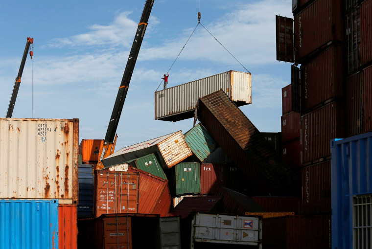 Image: Shipping containers toppled by strong winds of typhoon Meranti, are pictured in Kaohsiung
