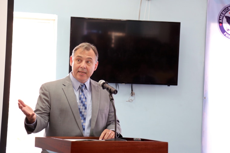 U.S. Ambassador to Cambodia William A. Heidt served as a witness to the signing of this agreement between the University of Arizona and the American University of Phnom Penh.