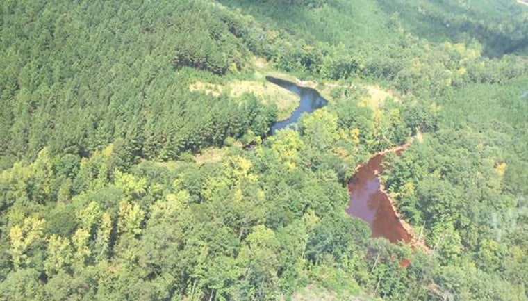 Aerial photo of two of the three mine water retention ponds at the incident site. The retention pond on the right is where the gasoline has been contained.