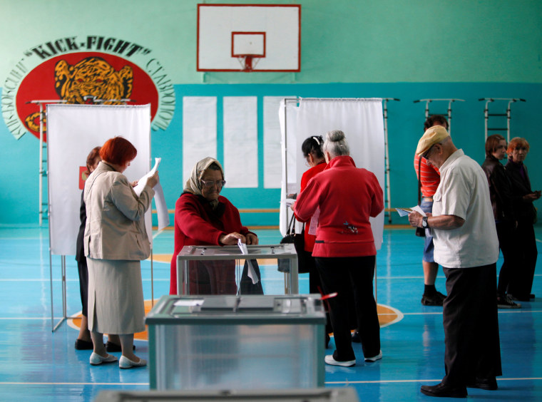 Image: People visit polling station during parliamentary election in Stavropol