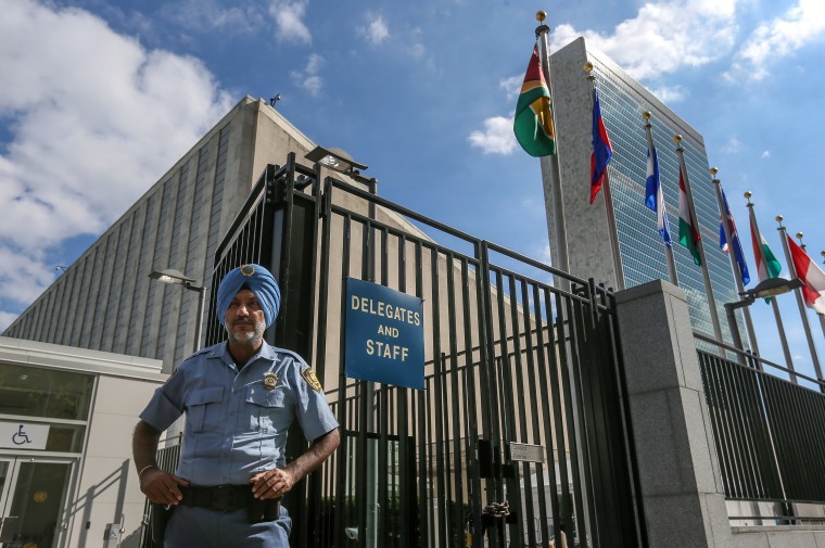 Image: A security officer at the entrance to the UN headquarters