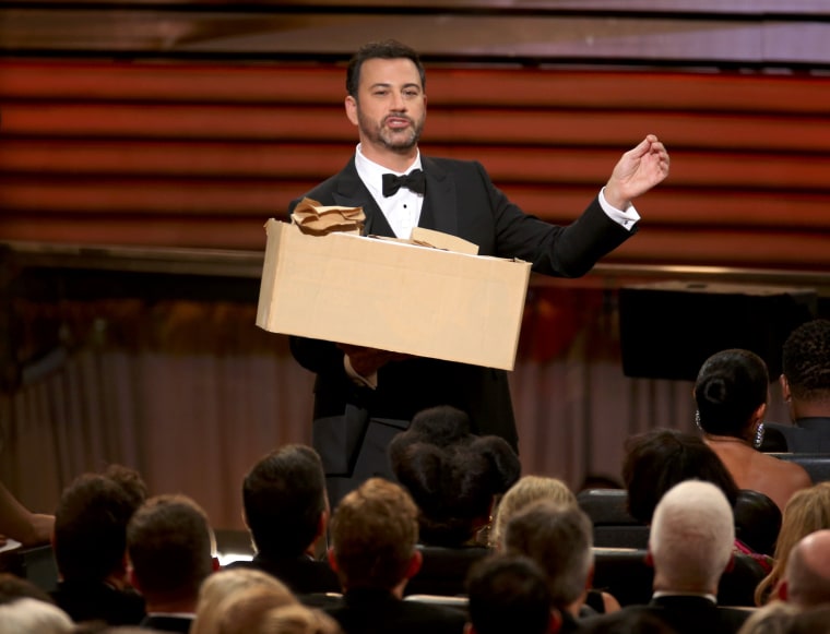 Image: Show host Jimmy Kimmel hands out sandwiches to the audience at the 68th Primetime Emmy Awards in Los Angeles,