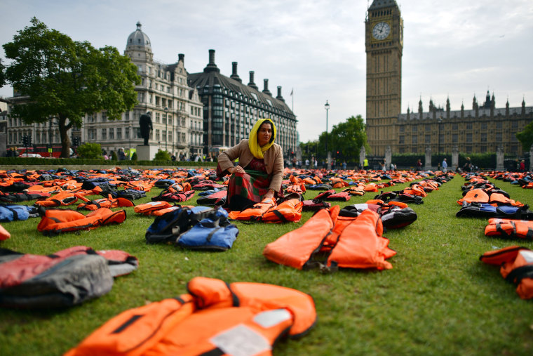 Image: Protestors Create A \"Graveyard Of Lifejackets\" To Coincide With The UN Migration Summit