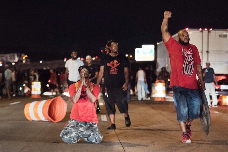 Image: People block traffic on I-85 during protests