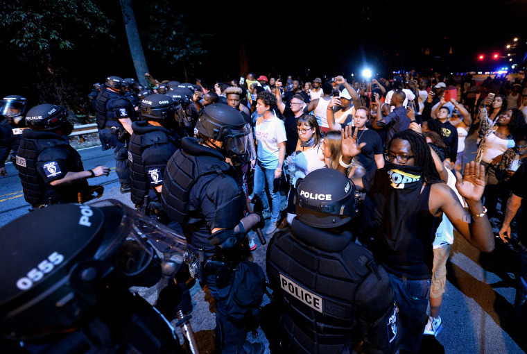 Charlotte, N.C., faces aftermath of protests ignited by fatal police shooting; 12 officers injured