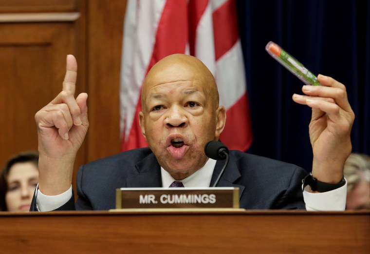 Image: House Oversight and Government Reform Committee ranking member Elijah Cummings (D-MD) holds an EpiPen during the committee hearing on the Rising Price of EpiPens at the Capitol in Washington