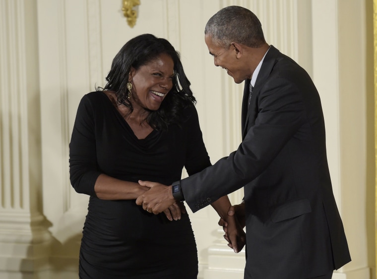 Image: President Barack Obama shares a laugh with actress and singer Audra McDonald