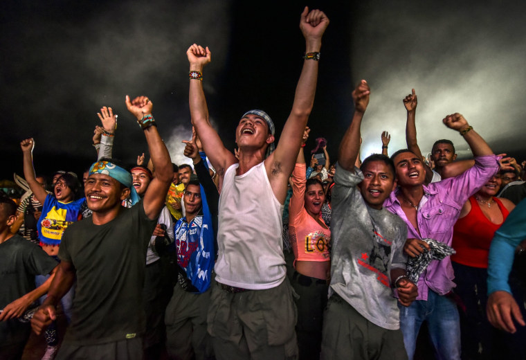 Image: Members of the Revolutionary Armed Forces of Colombia guerrilla dance during a cultural event