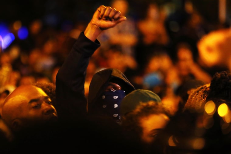 Image: Protesters rally during another night of protests over the police shooting of Keith Scott in Charlotte