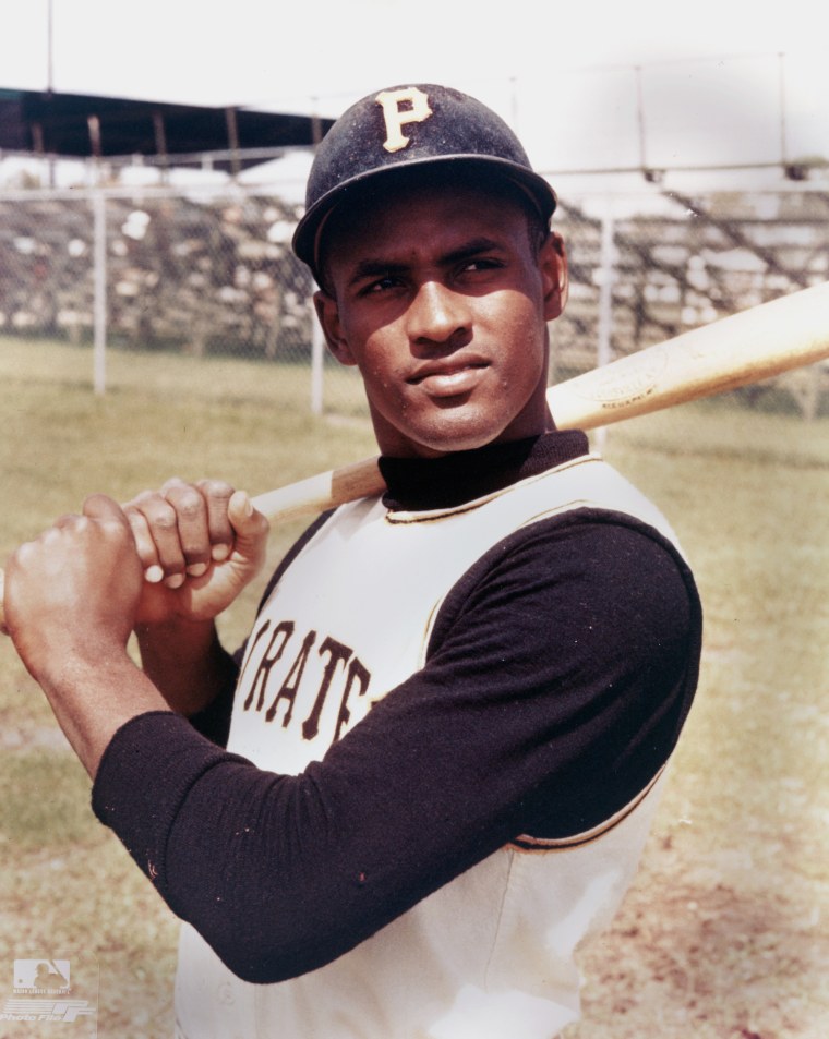Outfielders Roberto Clemente' #21 of the Pittsburgh Pirates bats
