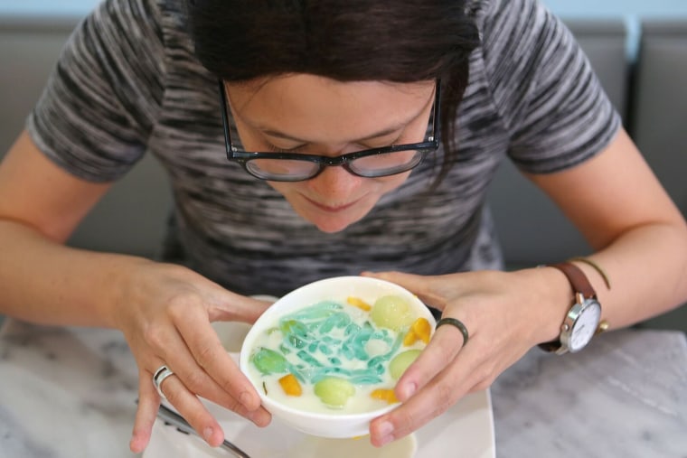 Emi drinking the ice cream soup