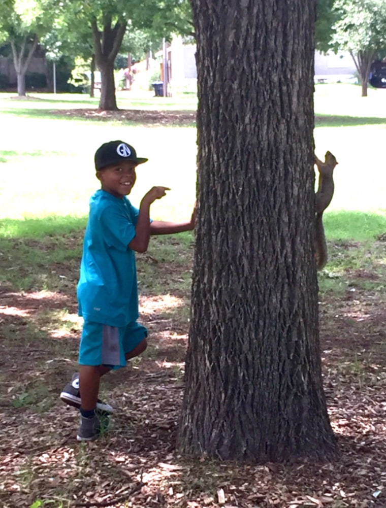 Brylan with a living squirrel.