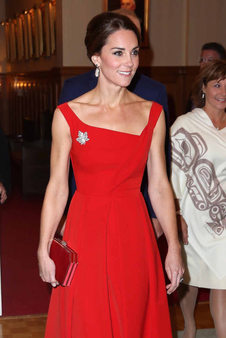 Duchess Kate stuns in red gown with asymmetrical neckline