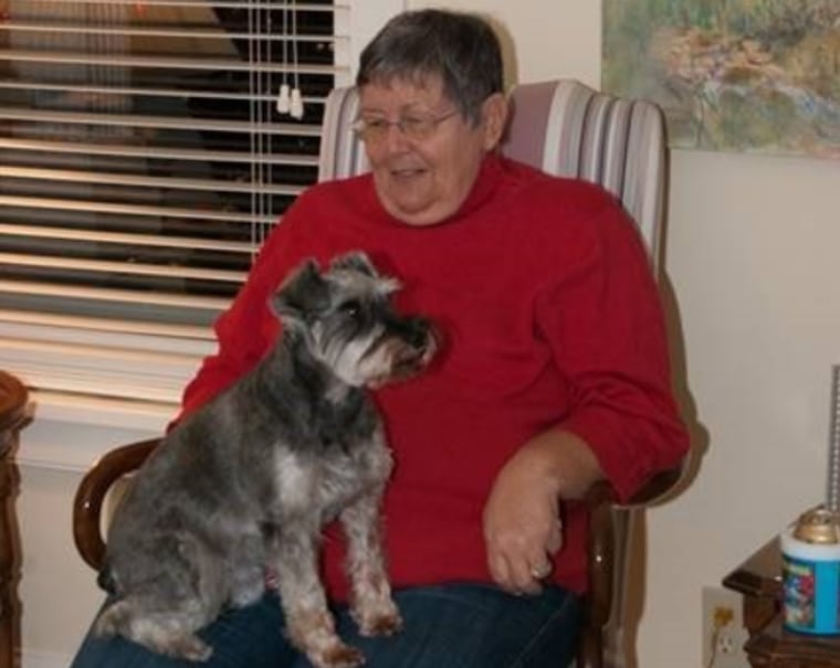 Louann VanKoevering is pictured with one of her miniature schnauzers.