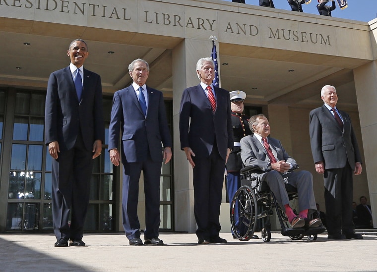 U.S. President Barack Obama stands alongside former presidents as they attend the dedication ceremony for the George W. Bush Presidential Center in Dallas