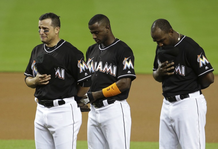 Image: Martin Prado, Adeiny Hechavarria, Marcell Ozuna