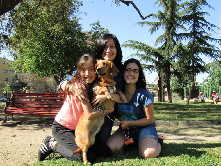 Gabby (left) with her mothers, Claudia Amigo (center) and Claudia Calderon (left)