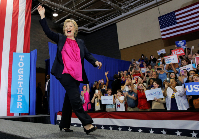 Image: U.S. Democratic presidential nominee Hillary Clinton takes the stage at a campaign rally in Raleigh