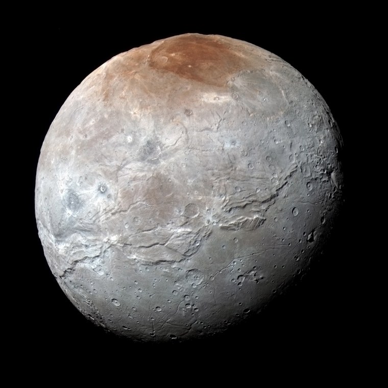 Image: Pluto???s largest moon, Charon, is seen in a high-resolution, enhanced color view captured by NASA's New Horizons spacecraft