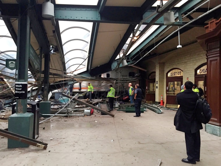 Image: A New Jersey Transit train that derailed and crashed through the station is seen in Hoboken, New Jersey