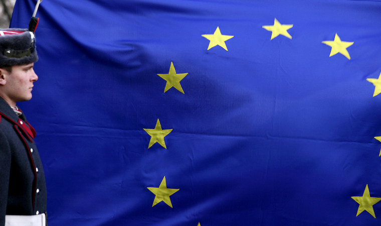 Image: Bulgarian soldier stands in front of EU flag in Sofia