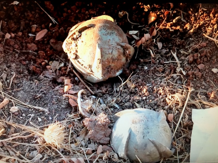 A frame from video shot on Wednesday at the M10 hospital in Aleppo, which appears to show two unexploded Russian-made cluster munitions amid the rubble of the hospital.