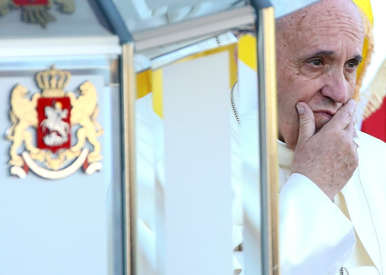 Image: Pope Francis looks on during a welcome ceremony at the Presidential palace in Tblisi