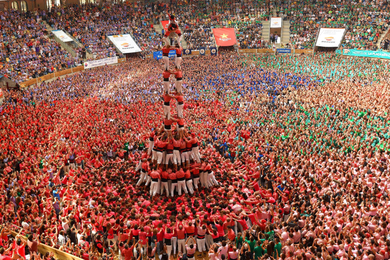Image: TOPSHOT-SPAIN-CATALONIA-HUMAN-TOWERS-CASTELLERS