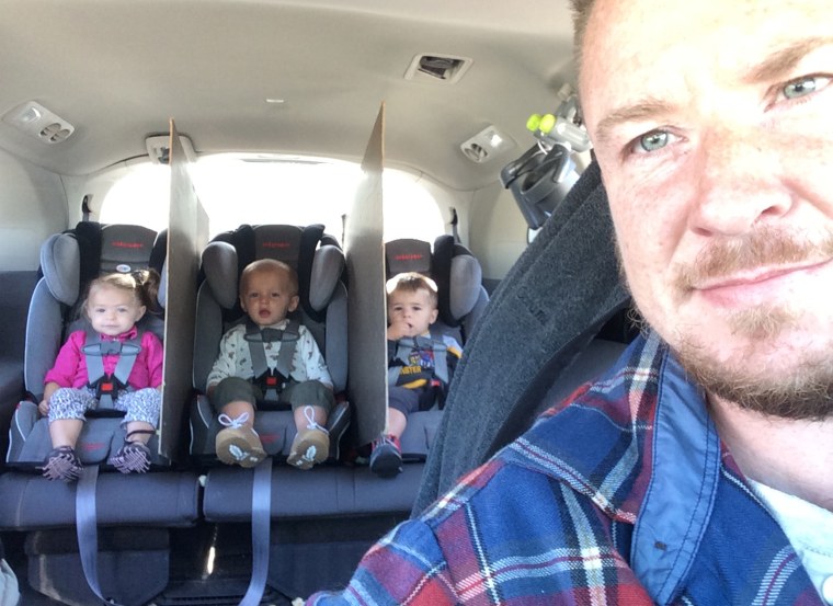 Gad goes viral after creating divider walls between his triplets' car seats to keep them from fighting.