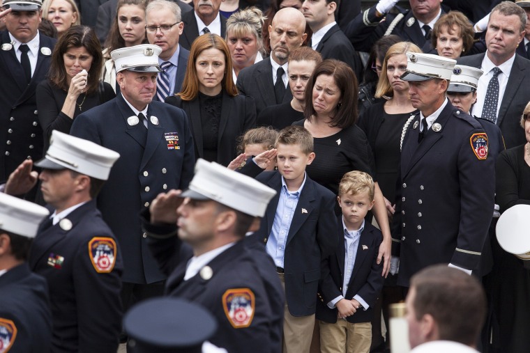 Fiona Fahy, the wife of Michael Fahy, with their children