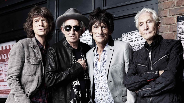 The Rolling Stones' Mick Jagger, Keith Richards, Ronnie Wood and Charlie Watts pose in front of The Marquee Club in London in this handout photograph received by Reuters on July 11, 2012. 