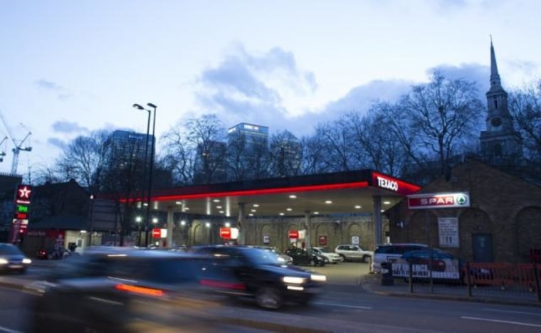 A Texaco service station displays the price of petrol and diesel close to the financial centre of London