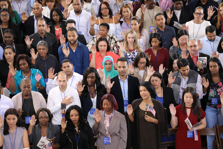 Image: Immigrants To U.S. Become Citizens During Naturalization Ceremony On Ellis Island