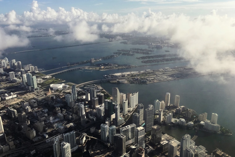 Image: Downtown Miami is pictured in this aerial photo as clouds begin to form in advance of Hurricane Matthew in Miami