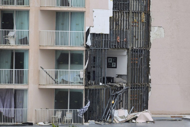 Image: Hotel rooms are exposed after a wall broke away at the RIU hotel
