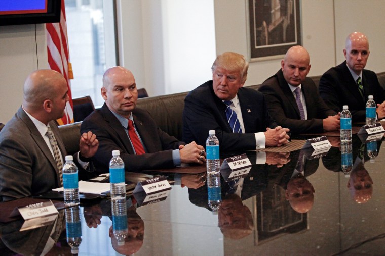 Image: Republican presidential nominee Donald Trump meets with leadership members of the National Border Patrol Council while receiving the group's endorsement during a meeting at Trump Tower in Manhattan
