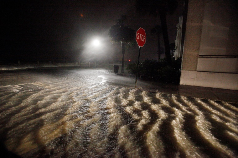 Image: Storm surge and rainwater begin to inundate King Steet at the southern-most tip of the city as Hurricane Matthew arrives in Charleston, South Carolina
