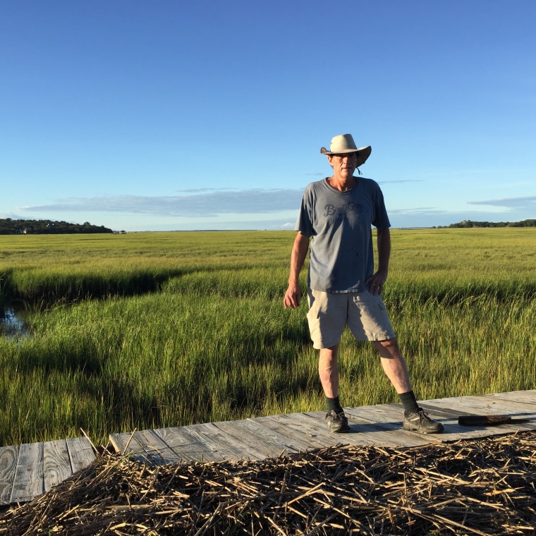 Kevin Mellogy of Little Piney Island in Fernandina Beach, Florida, stands on a section of his dock on Oct. 8 that was blown three quarters of a mile away from his house by Hurricane Matthew. \"I spotted it with my telescope,\" he says, \"Some of it probably washed back out. God knows where it is.\"
