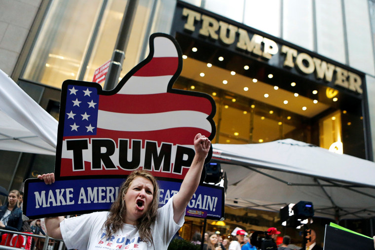 Image: Supporters of Republican presidential nominee Donald Trump stand outside Trump Tower where Trump lives, in the Manhattan borough of New York