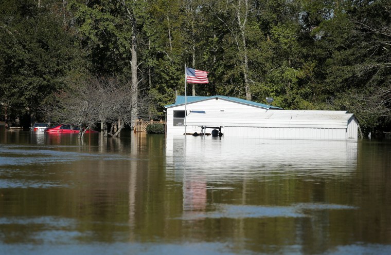 Image: A home is seen as flood waters rise after Hurricane Matthew in Lumberton
