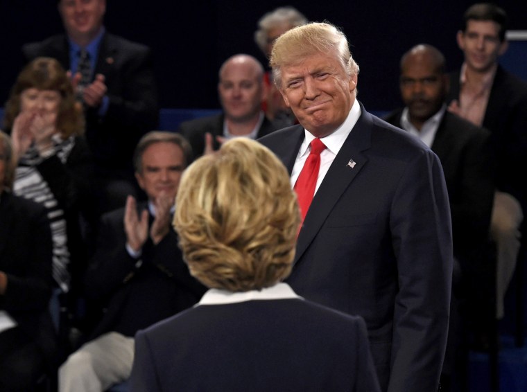 Image: Republican U.S. presidential nominee Trump and Democratic U.S. presidential nominee Clinton at the start of their presidential town hall debate at Washington University in St. Louis