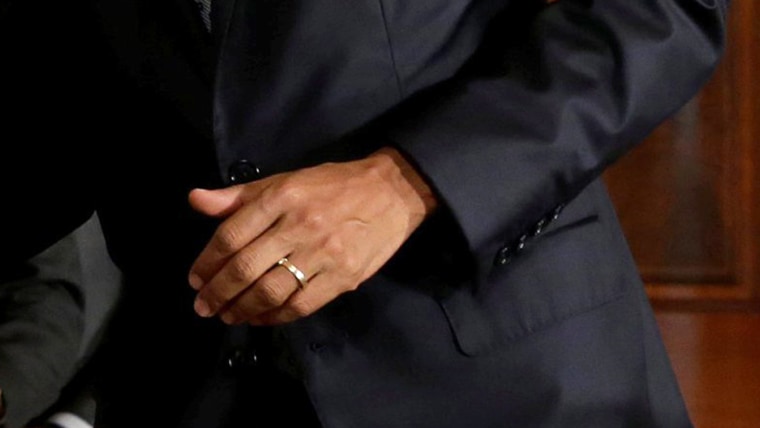 U.S. President Barack Obama's hand with wedding ring