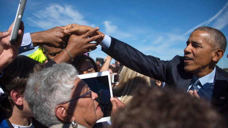 US President Barack Obama greets supporters