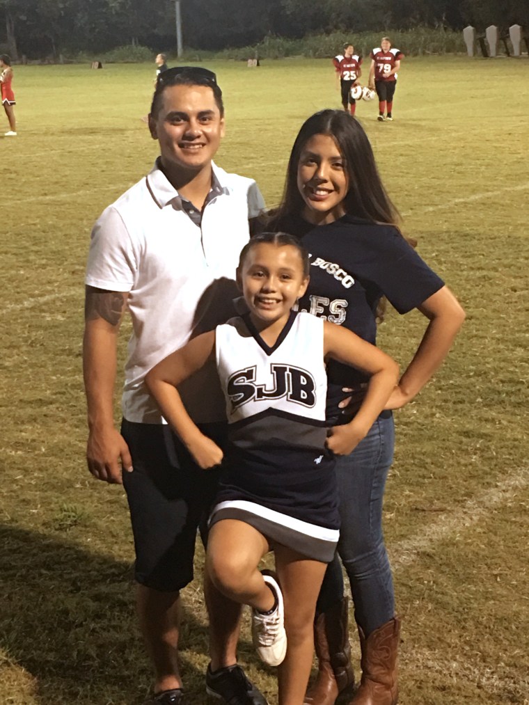 Cheerleader helped by hs student