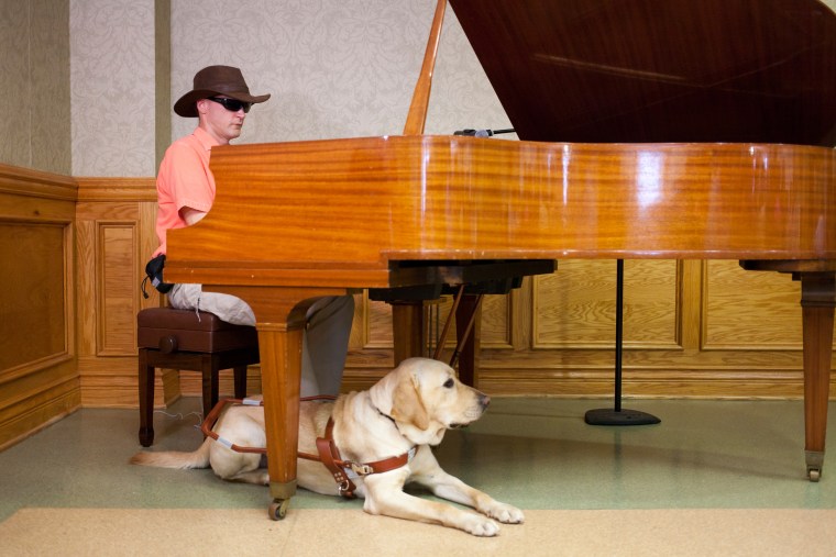 TODAY's first puppy with a purpose, Wrangler, graduates to become a full-time guide dog